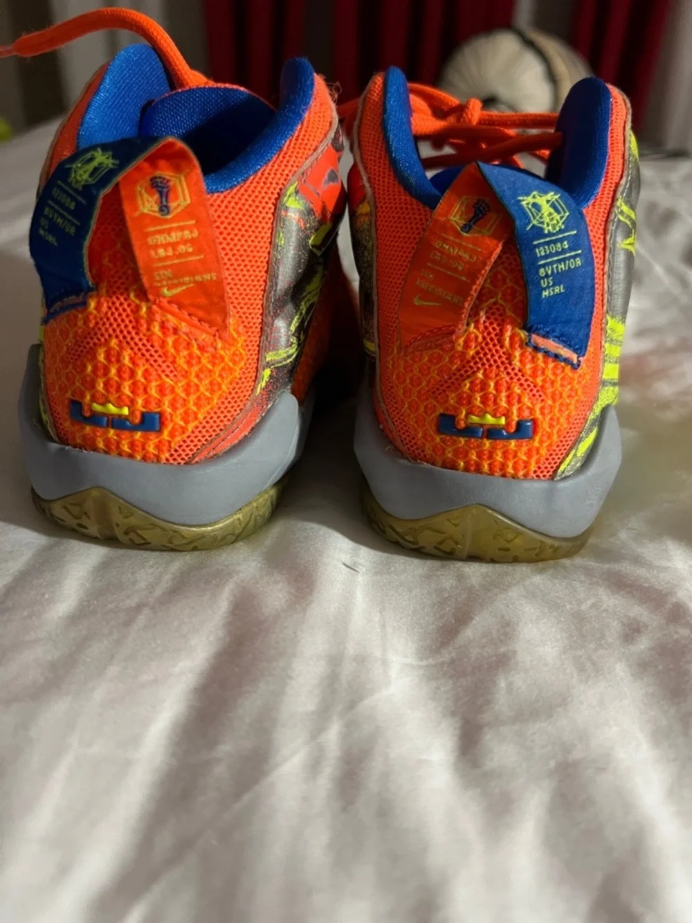 LeBron James Nike Orange Sneakers with Yellow Swoosh and Blue Lining